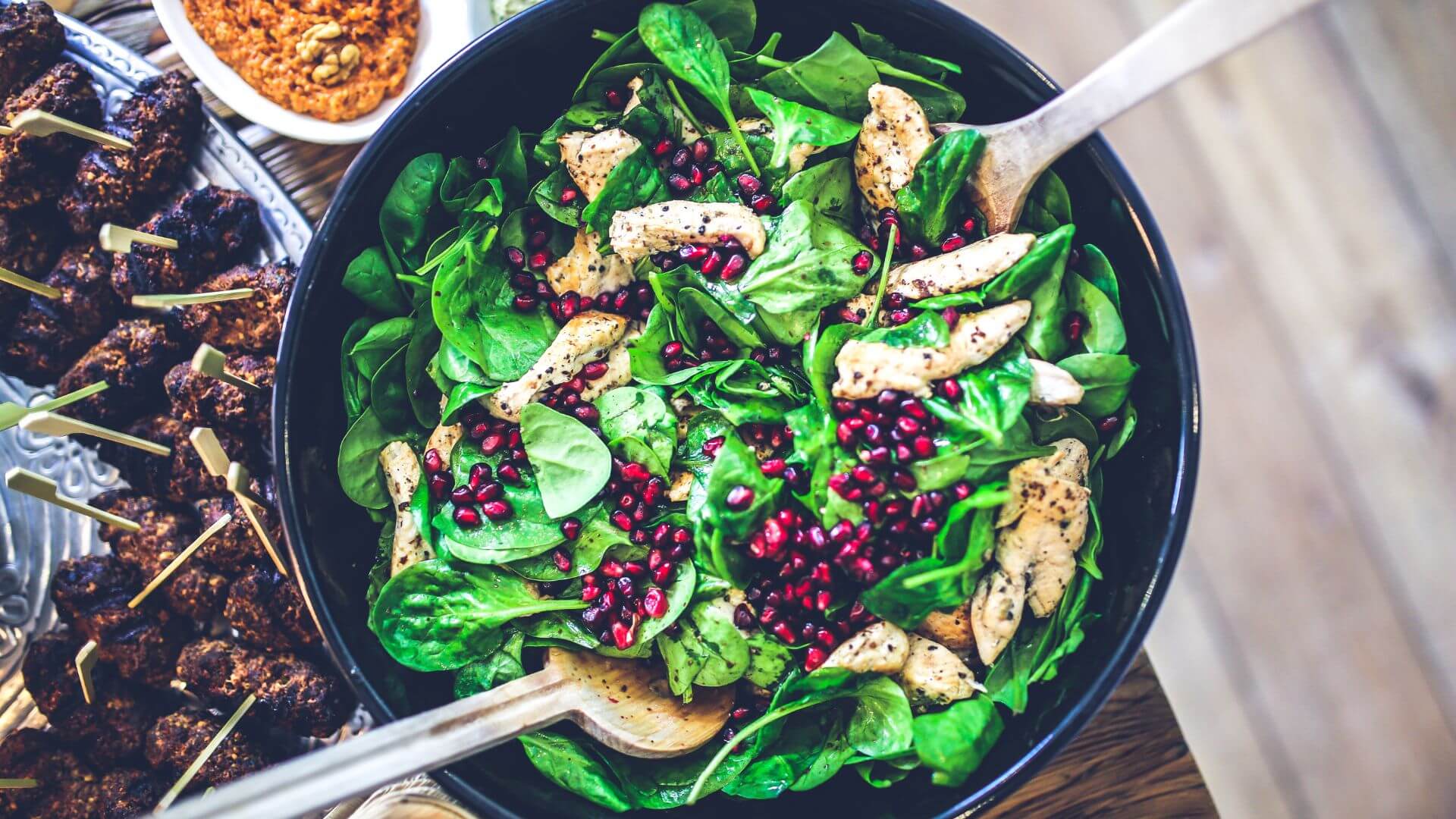 Kale and spinash salad in cooking pot in this Kale vs Spinach showdown